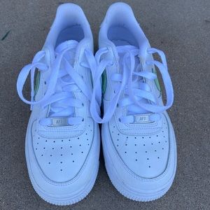 Nike Airforces with lime green swoosh and logo . Size 6. Only worn once.